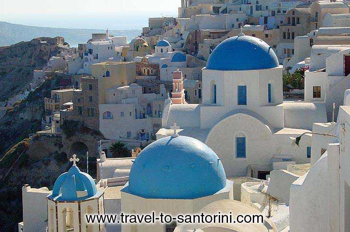 OIA VIEW - One of the photo trademarks of Santorini, the famous church of Anastasi in Oia by Gene Burch