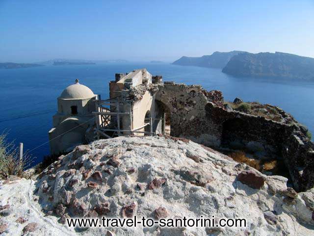 Remnants of the Venetian castle. Therasia in the background. SANTORINI PHOTO GALLERY - OIA