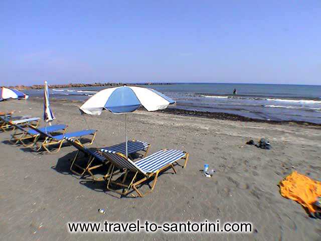 UMBRELLAS ON THE BEACH - View of the organised part of Monolithos with the umbrellas.