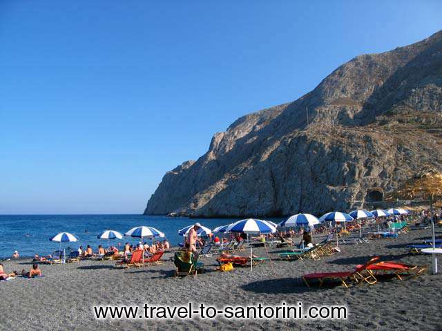 Messa Vouno - The right edge of Kamari beach ends at Messa Vouno the oldest part of Santorini, the only part of the land on the island that didn't come from the volcano. Messa Vouno separates Kamari from Perissa the other main beach of Santorini.