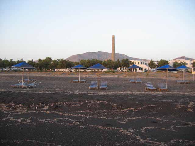 Monolithos beach view - The view of the old Tomato Factory at Monolithos Beach from the beach.