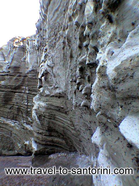 Wall of pumice stone - Pumice stone walls at Kouloumbo beach by Ioannis Matrozos