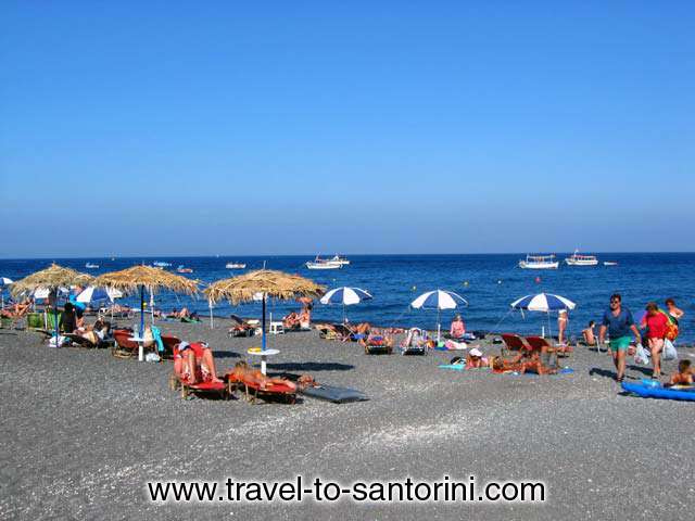 KAMARI BEACH - View of Kamari beach with black sand by Ioannis Matrozos