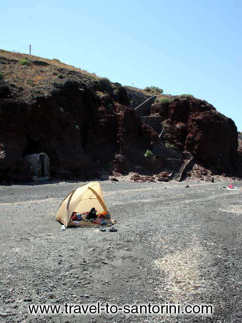 TENT AND STAIRWAY - The beach and in the background the stairs leading to the beach from the road