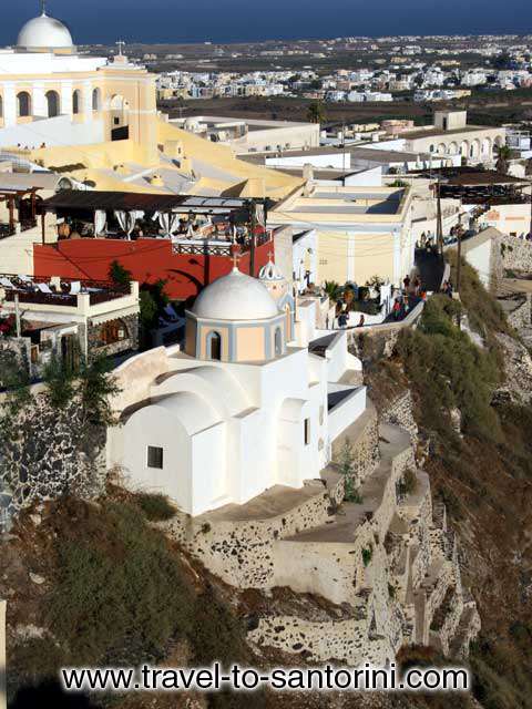 CHURCH - A church built at the edge of caldera in Fira in front of the Catholic Cathedral