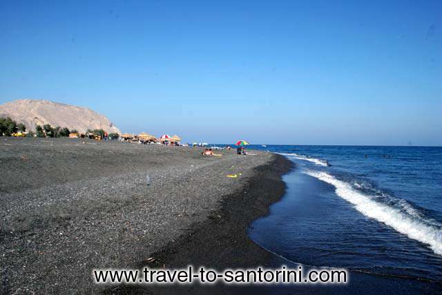 Perivolos beach - View of Perivolos beach with the mountain of Profitis Ilias in the background by Ioannis Matrozos