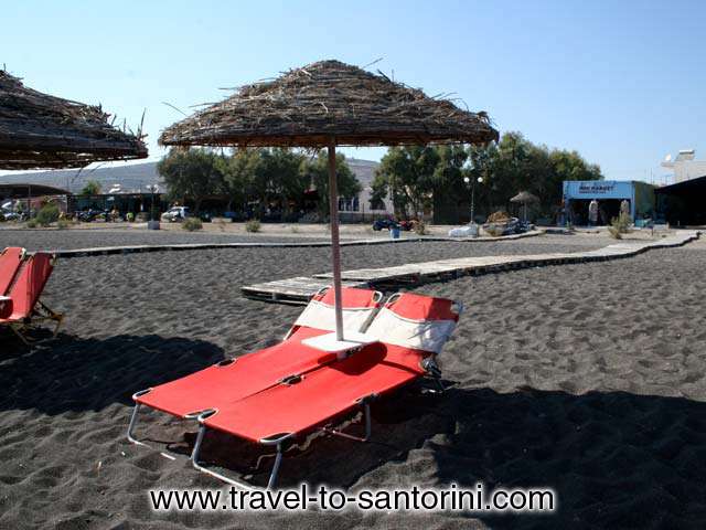 UMBRELLA - The biggest part of Perivolos beach is organised with umbrellas