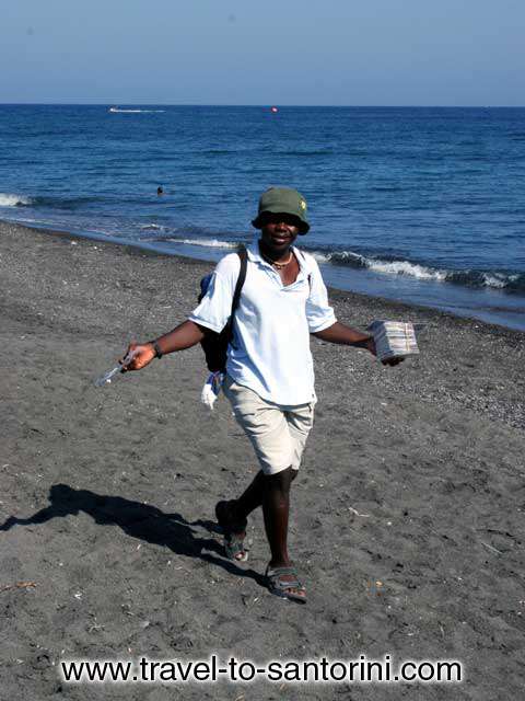 MAN - Man selling music cds in Perivolos beach