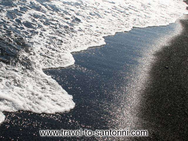 FLISVOS - Wave on the sand of Perivolos beach