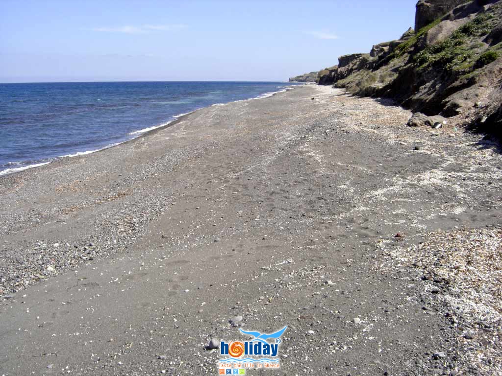 Baxedes beach sand - View of the sand and pebble beach of Baxedes at the east part of Santorini, in the area of Oia