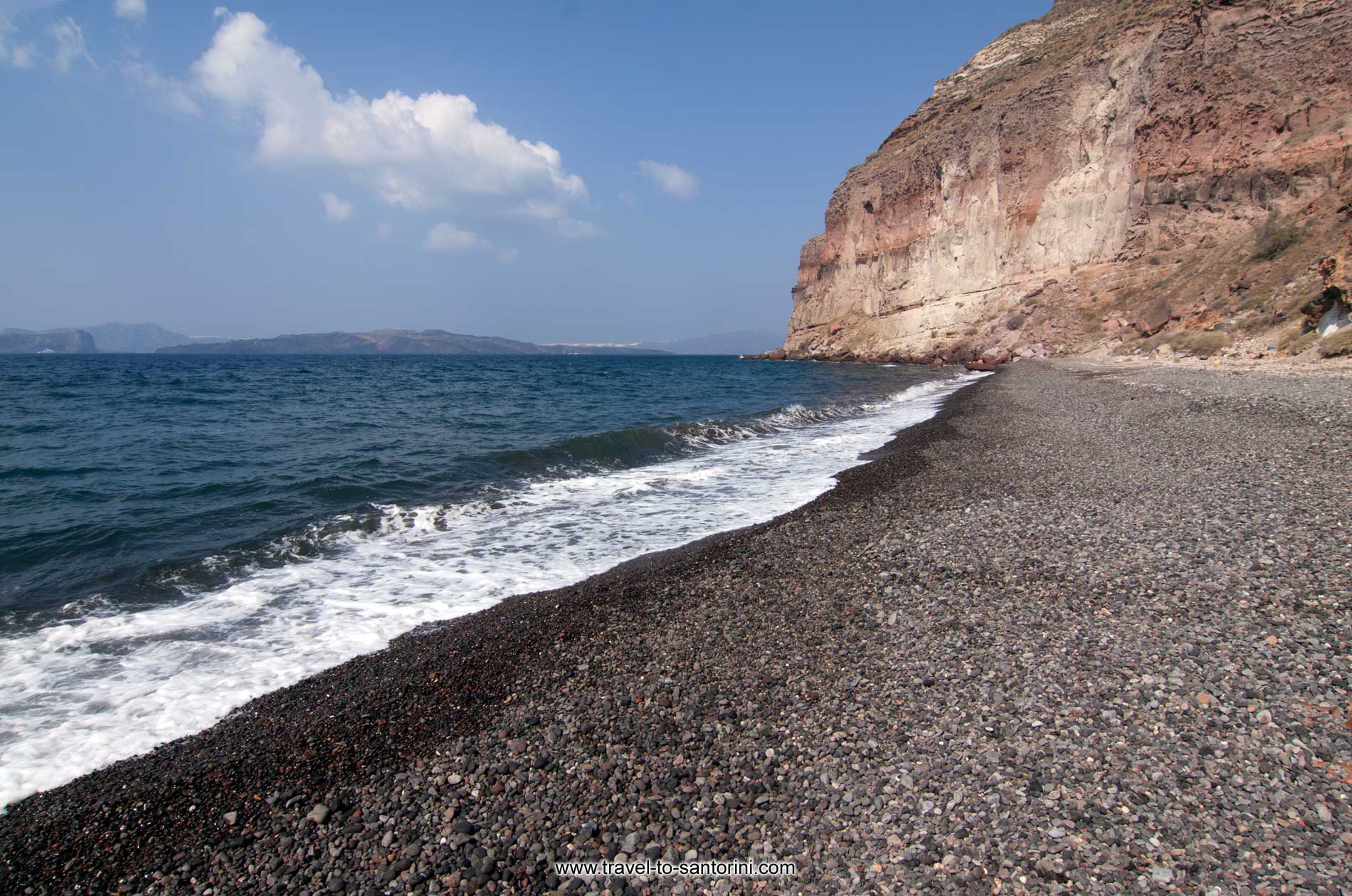 Tou Christou Ta Thermi - The secluded beach of Christou Ta Thermi inside the caldera bay by Ioannis Matrozos