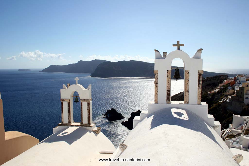 Oia church - View of Oia caldera from a church in Oia. Thirassia in the background.