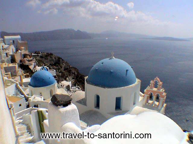 ANASTASI CHURCH - Anastasi church in Oia. Imerovigli and Kameni (volcano) in the background.