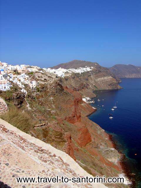 CALDERA VIEW - View of the village, Perivolas and the caldera from the castle in Oia by Ioannis Matrozos