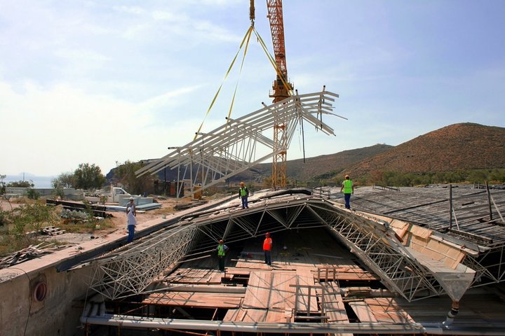 The Consortium which constructs the Shelter above the Prehistoric Site of Akrotiri has already started removing the old roof which will be replaced by a new one... The goal is the archaeological site to be open to the public in the summer of 2011....